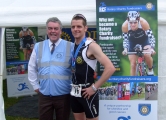 Top Individual Fundraiser Robert Fletcher, Ironman 70.3 UK Exmoor with Ian Dodds, trustee/secretary Rotary Charity Fundraisers � June 2012